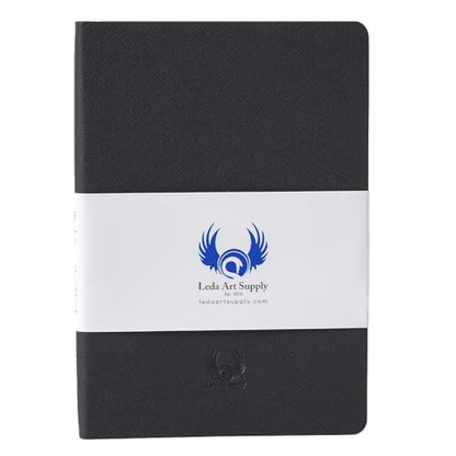 Leda Art Lay-Flat Sketchbook for Drawing, A5 Cream Paper, 160 Pages, Black | Artist sketchbook with smooth cream paper, thread-sewn lay-flat binding, elastic strap, accordion back pocket (5.8 x 8.3 in) - size: Medium Black