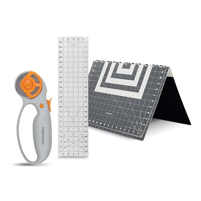 Fiskars 3-Piece Fabric Cutting Set, Rotary Cutter, Cutting Mat & Ruler | 45mm Ergonomic Loop Rotary Cutter w/ Blade, Sewing Ruler to Cut Directly from the Bolt, Folding Cutting Mat for Easy Storage