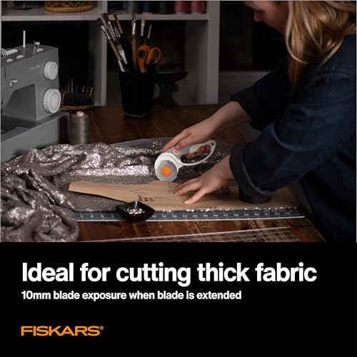 Fiskars 60mm Loop Titanium SoftGrip Rotary Cutter for Fabric & Sewing | Ergonomic Loop Handle Improves Control, Cuts Thick Materials, Easy and Safe Blade Changes, Sewing & Quilting Tools