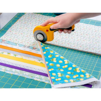 OLFA 60mm Ergonomic Squeeze-Handle Rotary Cutter (RTY-3/DX) - 12-Layer | 60mm endurance tungsten steel, squeeze trigger auto-retract - Heavy-duty fabric cutting - Quilters and Crafters