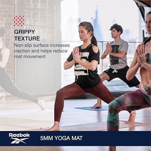 Reebok 5mm Solid Yoga Mat 68" x 24" Non-Slip, Lightweight, Foldable, and Durable Exercise Mat with Carry Strap for Home Workout, Yoga, Pilates, Fitness, and Outdoor Training - color: Hoops Blue