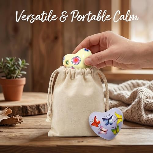 2 Pcs Heart Shaped Meditation Chime Bell Set, 1.77'' Hand-Painted Stainless Steel Hand Chimes for Anxiety Relief and Calm, Decorative Healing Bells with Cotton Pouches - Whimsical Nature